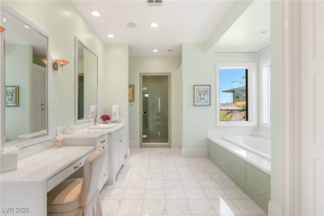 11 Misty Peaks Ct, Las Vegas, NV 89135 - full bath featuring vanity, a bath, a stall shower, marble finish floors, and recessed lighting
