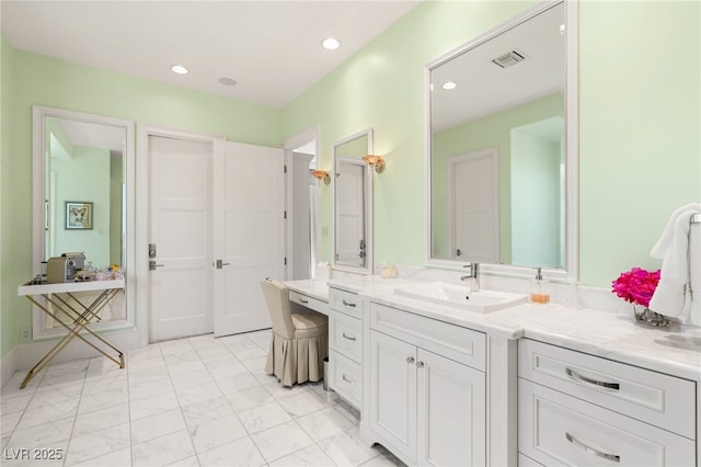11 Misty Peaks Ct, Las Vegas, NV 89135 - bathroom featuring marble look tiles, vanity, and recessed lighting
