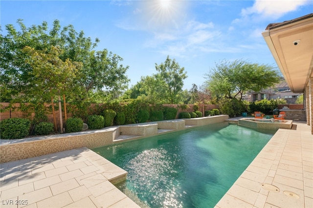 11 Misty Peaks Ct, Las Vegas, NV 89135 - view of pool featuring a fenced backyard, a patio area, and a pool with connected hot tub