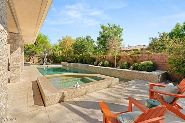 11 Misty Peaks Ct, Las Vegas, NV 89135 - swimming pool featuring an in-ground hot tub, a patio, and a fenced backyard