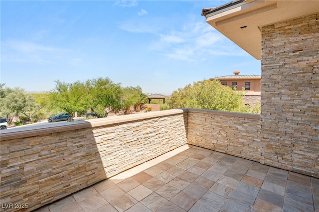 11 Misty Peaks Ct, Las Vegas, NV 89135 - view of patio / terrace with a balcony
