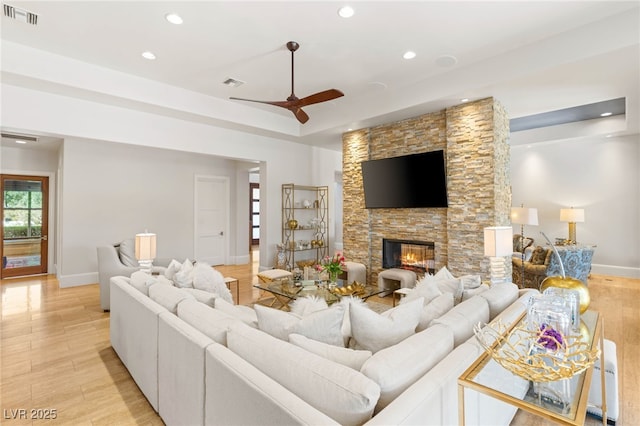11 Misty Peaks Ct, Las Vegas, NV 89135 - living area with recessed lighting, ceiling fan, baseboards, light wood-type flooring, and a fireplace