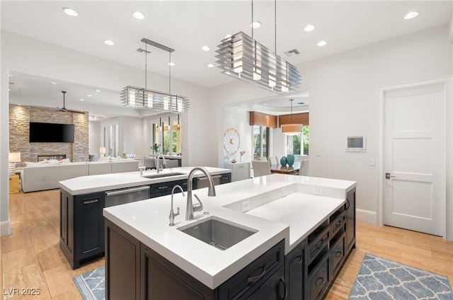11 Misty Peaks Ct, Las Vegas, NV 89135 - kitchen featuring a kitchen island with sink, a sink, open floor plan, a ceiling fan, and recessed lighting