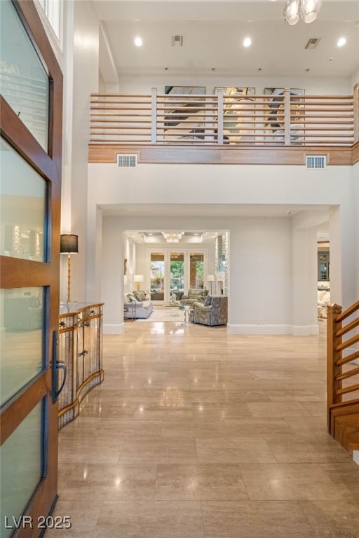11 Misty Peaks Ct, Las Vegas, NV 89135 - hallway with a towering ceiling, baseboards, and recessed lighting