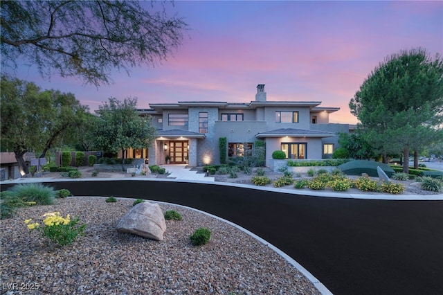 11 Misty Peaks Ct, Las Vegas, NV 89135 - prairie-style house with french doors, a chimney, and stucco siding
