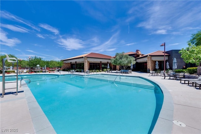 11 Misty Peaks Ct, Las Vegas, NV 89135 - community pool with a patio