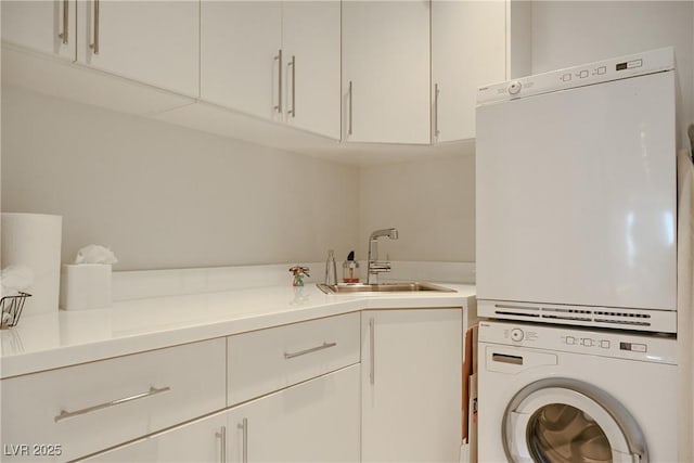 3750 Las Vegas Blvd Unit 4303, Las Vegas, NV 89158 - laundry room with estacked washer and dryer and cabinet space