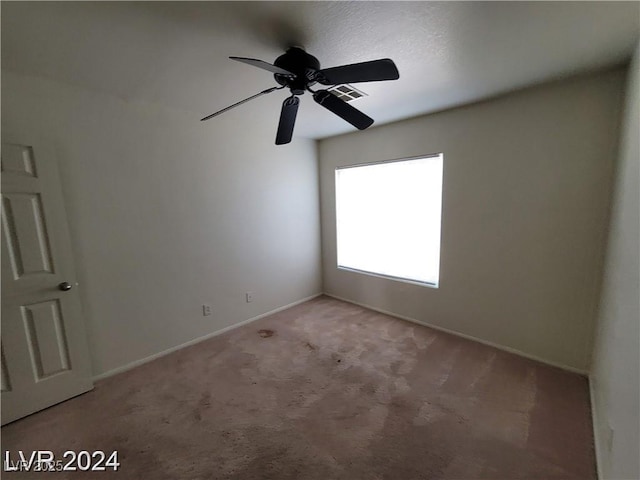 2711 Morning Break Ct, Las Vegas, NV 89142 - carpeted spare room featuring baseboards and a ceiling fan