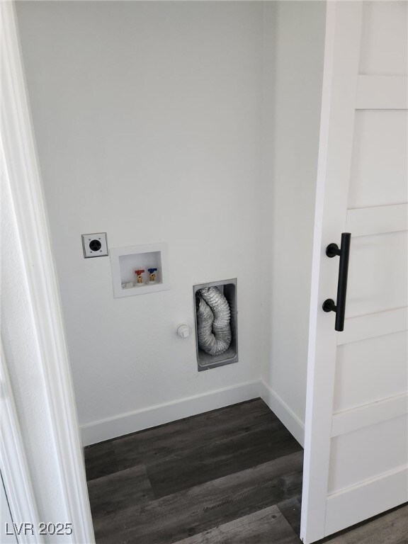 4231 E Kellogg Rd, Pahrump, NV 89061 - washroom with washer hookup, electric dryer hookup, baseboards, dark wood-style flooring, and gas dryer hookup