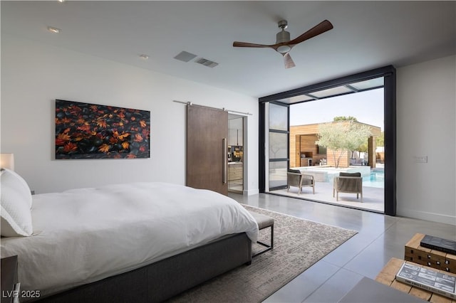 7030 Schirlls St, Las Vegas, NV 89118 - bedroom with access to exterior, a wall of windows, a barn door, and a ceiling fan
