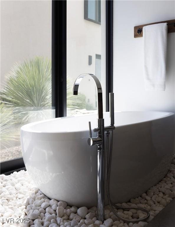 7030 Schirlls St, Las Vegas, NV 89118 - bathroom view of a freestanding bath and a sink