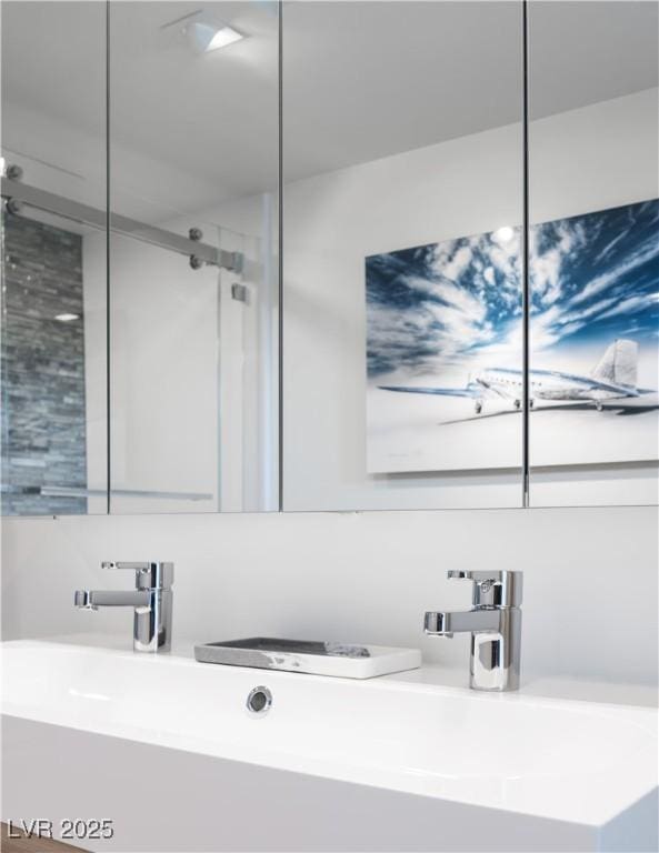 7030 Schirlls St, Las Vegas, NV 89118 - bathroom with vanity and an enclosed shower