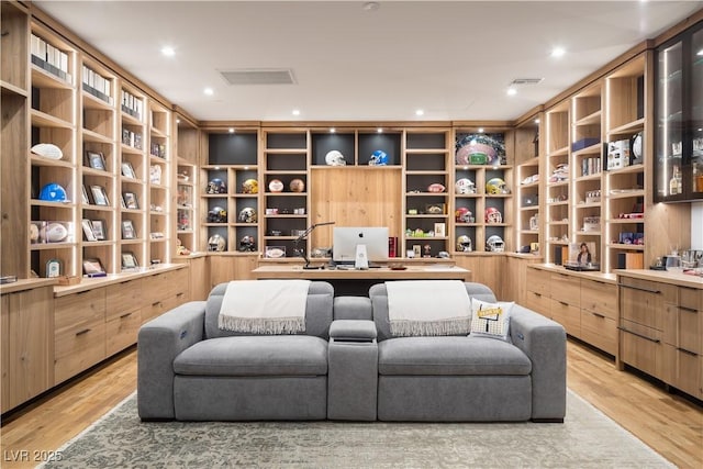 7030 Schirlls St, Las Vegas, NV 89118 - office area with built in desk and light wood-style floors