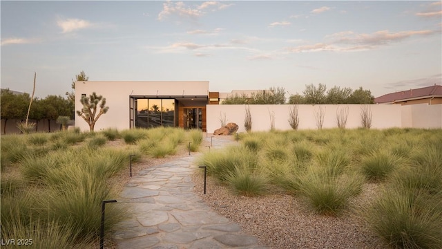 7030 Schirlls St, Las Vegas, NV 89118 - view of yard at dusk
