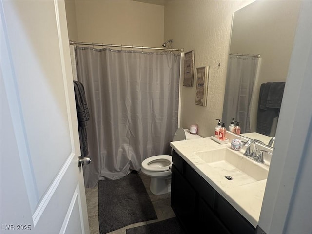 933 Kimbark Ave, Las Vegas, NV 89148 - full bathroom featuring toilet, vanity, and a textured wall