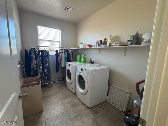933 Kimbark Ave, Las Vegas, NV 89148 - washroom with washing machine and dryer and light tile patterned floors