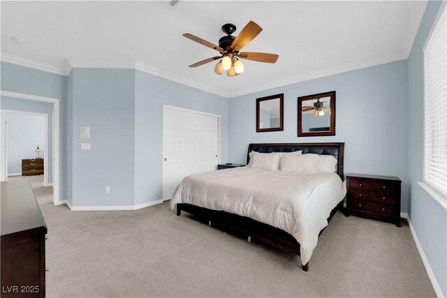 8268 Nelson Ridge Ln, Las Vegas, NV 89178 - bedroom with light colored carpet, ornamental molding, a closet, and ceiling fan