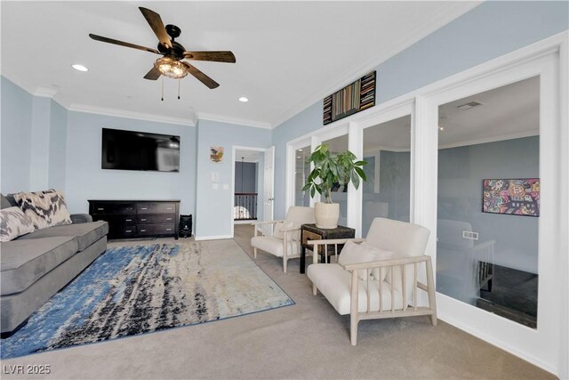 8268 Nelson Ridge Ln, Las Vegas, NV 89178 - carpeted living area featuring a ceiling fan, ornamental molding, and recessed lighting