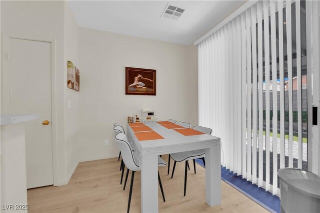 2633 Spider Cactus Ct, Las Vegas, NV 89106 - dining area featuring light wood-style floors