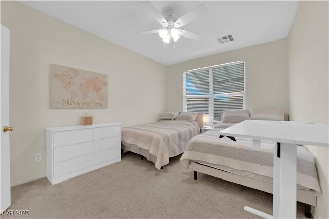 2633 Spider Cactus Ct, Las Vegas, NV 89106 - bedroom featuring light colored carpet and a ceiling fan