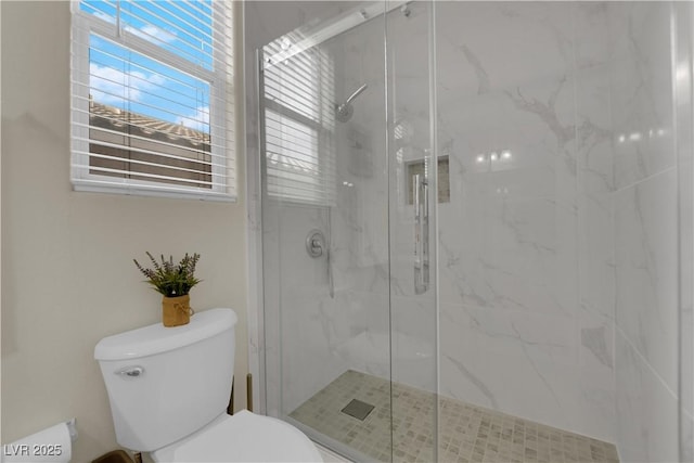 2633 Spider Cactus Ct, Las Vegas, NV 89106 - bathroom featuring toilet and a marble finish shower