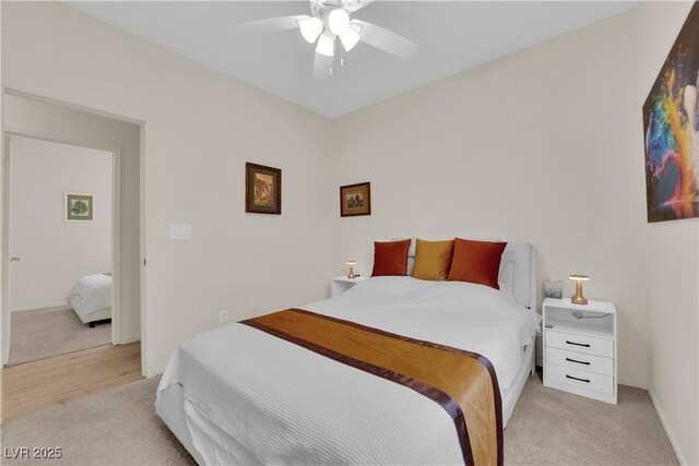 2633 Spider Cactus Ct, Las Vegas, NV 89106 - bedroom with light colored carpet, baseboards, and ceiling fan