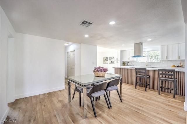 1731 Sherwin Ln, Las Vegas, NV 89156 - dining area with light wood finished floors, recessed lighting, and baseboards
