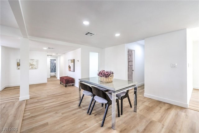 1731 Sherwin Ln, Las Vegas, NV 89156 - dining room with light wood-style floors, baseboards, and recessed lighting