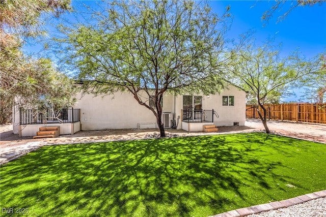 1731 Sherwin Ln, Las Vegas, NV 89156 - back of property with stucco siding and ac unit