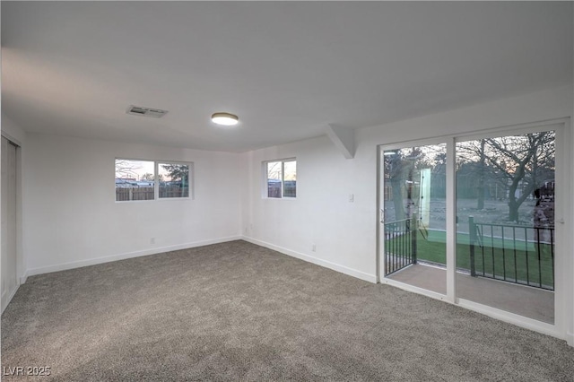 1731 Sherwin Ln, Las Vegas, NV 89156 - empty room with carpet, baseboards, and healthy amount of natural light