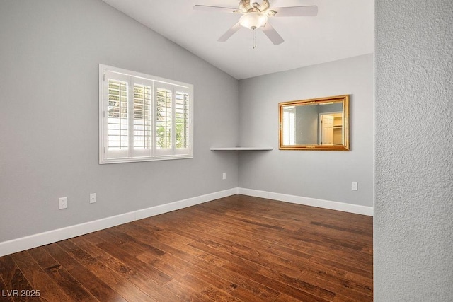 5099 Mascaro Dr, Las Vegas, NV 89122 - empty room with hardwood / wood-style flooring, lofted ceiling, ceiling fan, and baseboards