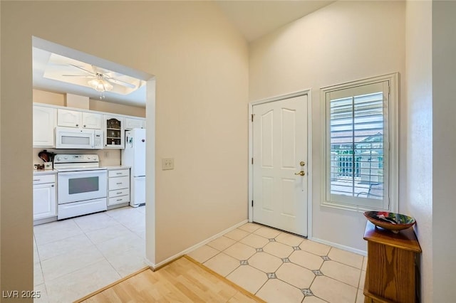 9024 Starmount Dr, Las Vegas, NV 89134 - entryway featuring baseboards, a high ceiling, and ceiling fan