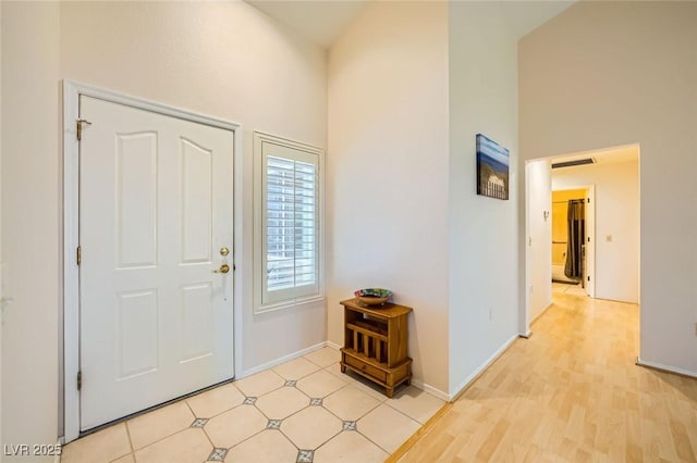9024 Starmount Dr, Las Vegas, NV 89134 - foyer entrance featuring a high ceiling and baseboards