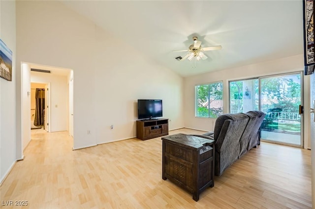9024 Starmount Dr, Las Vegas, NV 89134 - living room with light wood-type flooring, ceiling fan, lofted ceiling, and baseboards