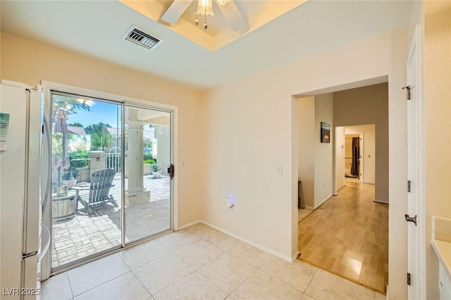 9024 Starmount Dr, Las Vegas, NV 89134 - spare room with ceiling fan, light tile patterned floors, and baseboards
