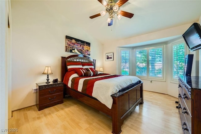 9024 Starmount Dr, Las Vegas, NV 89134 - bedroom with light wood-style flooring and ceiling fan