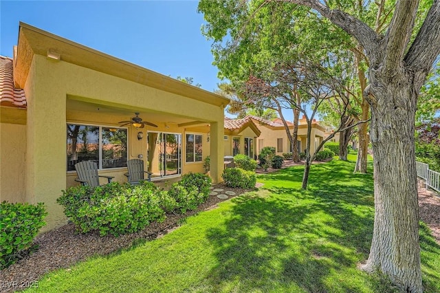 9024 Starmount Dr, Las Vegas, NV 89134 - view of grassy yard with a ceiling fan