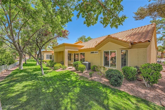 9024 Starmount Dr, Las Vegas, NV 89134 - back of property with a tiled roof, stucco siding, and central air condition unit