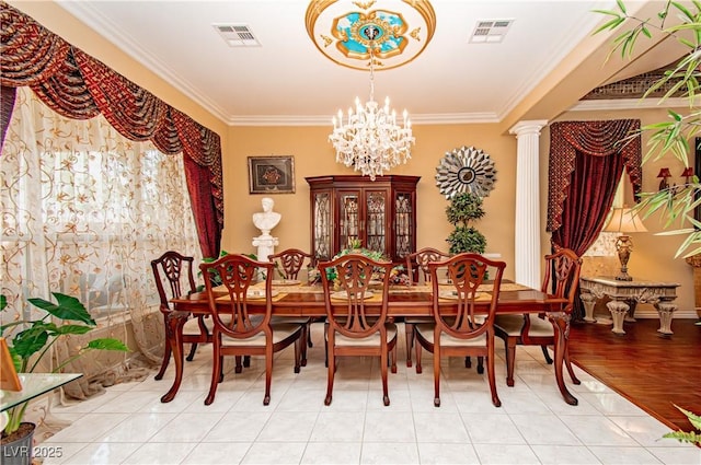 10798 Tapestry Winds St, Las Vegas, NV 89141 - dining room with ornamental molding, a chandelier, and decorative columns