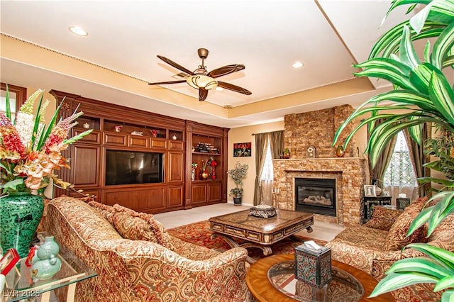 10798 Tapestry Winds St, Las Vegas, NV 89141 - living area with ceiling fan, a fireplace, and recessed lighting