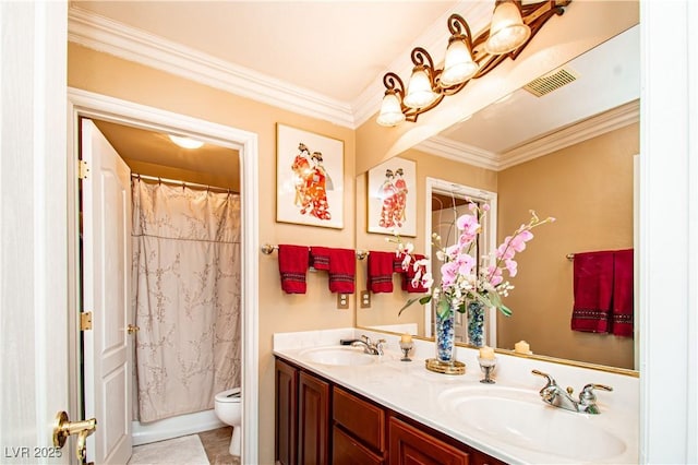 10798 Tapestry Winds St, Las Vegas, NV 89141 - full bathroom with double vanity, toilet, and ornamental molding