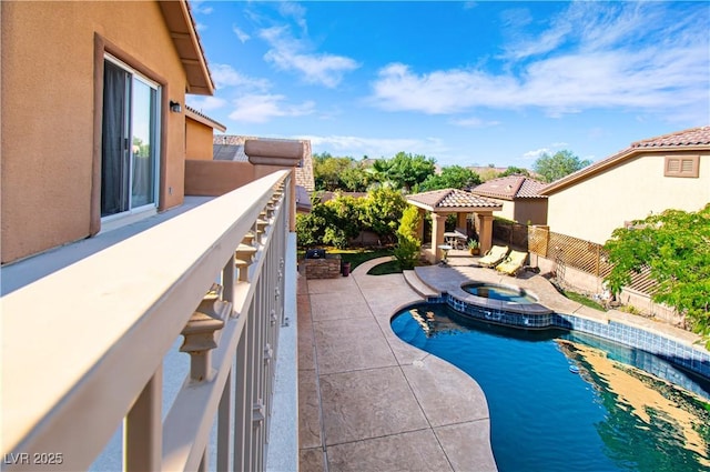 10798 Tapestry Winds St, Las Vegas, NV 89141 - view of pool with a gazebo, a pool with connected hot tub, and a fenced backyard