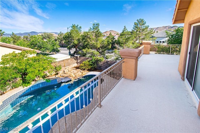 10798 Tapestry Winds St, Las Vegas, NV 89141 - balcony with view of pool and a mountain view