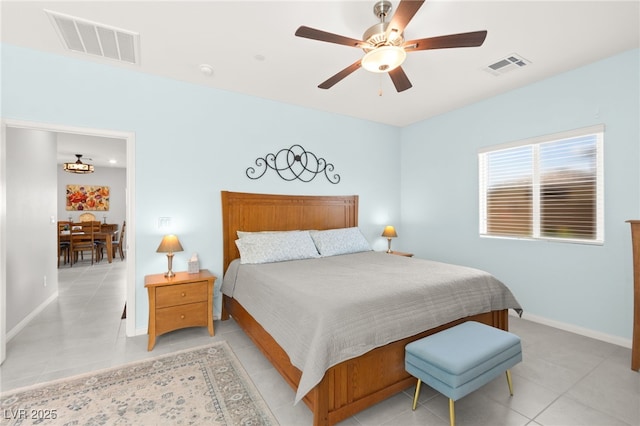 10951 Stone Crossing Ave, Las Vegas, NV 89166 - bedroom with light tile patterned flooring, baseboards, and a ceiling fan