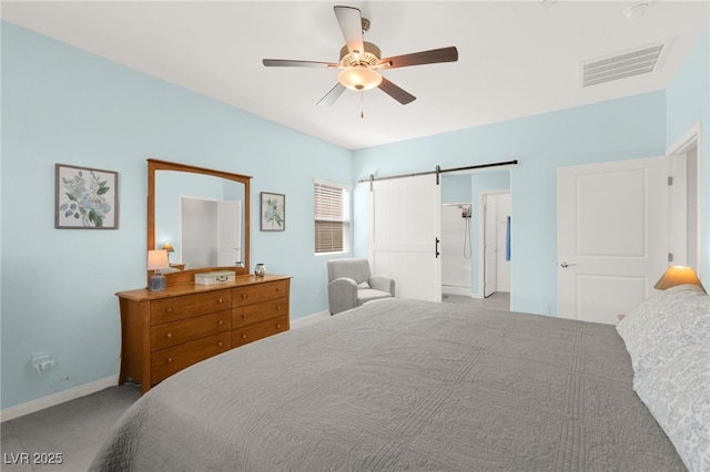 10951 Stone Crossing Ave, Las Vegas, NV 89166 - carpeted bedroom featuring a barn door, baseboards, and ceiling fan
