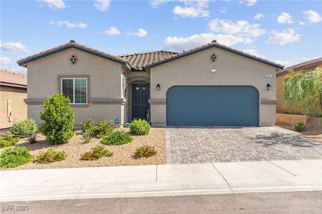 10951 Stone Crossing Ave, Las Vegas, NV 89166 - mediterranean / spanish-style house with a tiled roof, stucco siding, driveway, and a garage