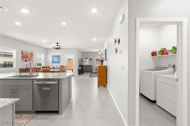 10951 Stone Crossing Ave, Las Vegas, NV 89166 - kitchen featuring dishwasher, independent washer and dryer, a sink, gray cabinetry, and recessed lighting