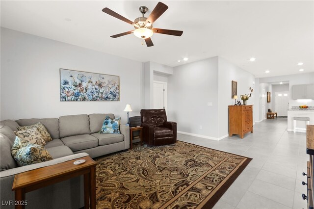 10951 Stone Crossing Ave, Las Vegas, NV 89166 - living room with ceiling fan, light tile patterned flooring, recessed lighting, and baseboards