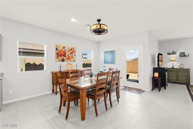 10951 Stone Crossing Ave, Las Vegas, NV 89166 - dining area featuring baseboards, light tile patterned floors, and recessed lighting