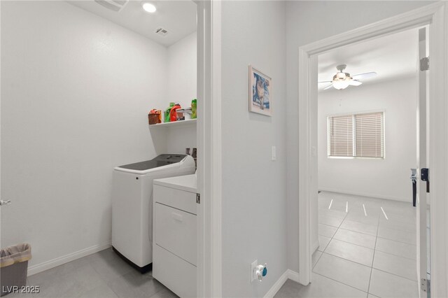 10951 Stone Crossing Ave, Las Vegas, NV 89166 - laundry room featuring washer and dryer, light tile patterned floors, baseboards, and ceiling fan